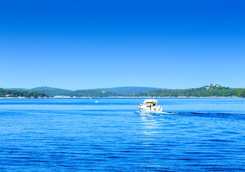 Blue water of Mali Losinj with speedboat