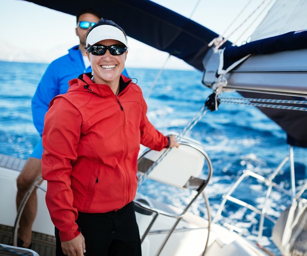 skipper and hostess on the catamaran
