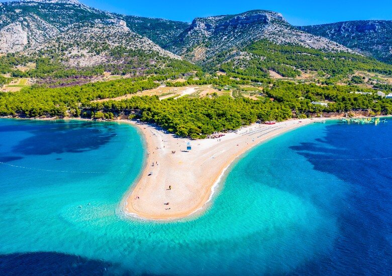 Aerial shot of Zlatni Rat Beach sandbank with turquoise water